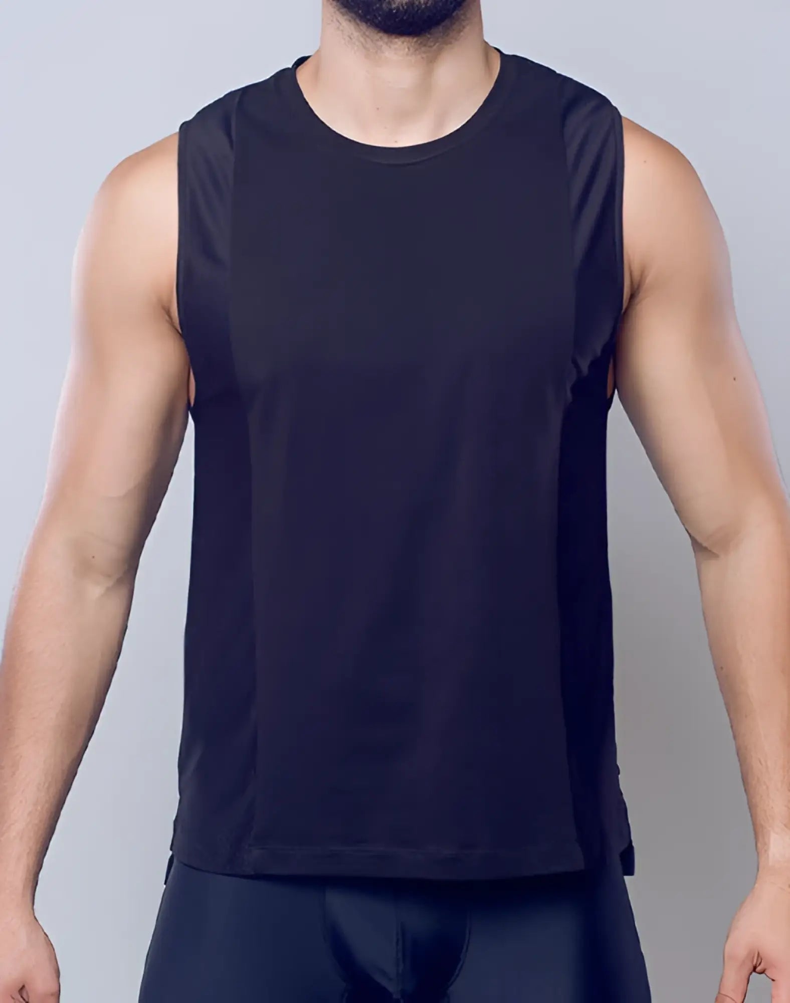 Black sleeveless SUPAWEAR Supa Pro singlet with breathable mesh side panels for athletic performance wear