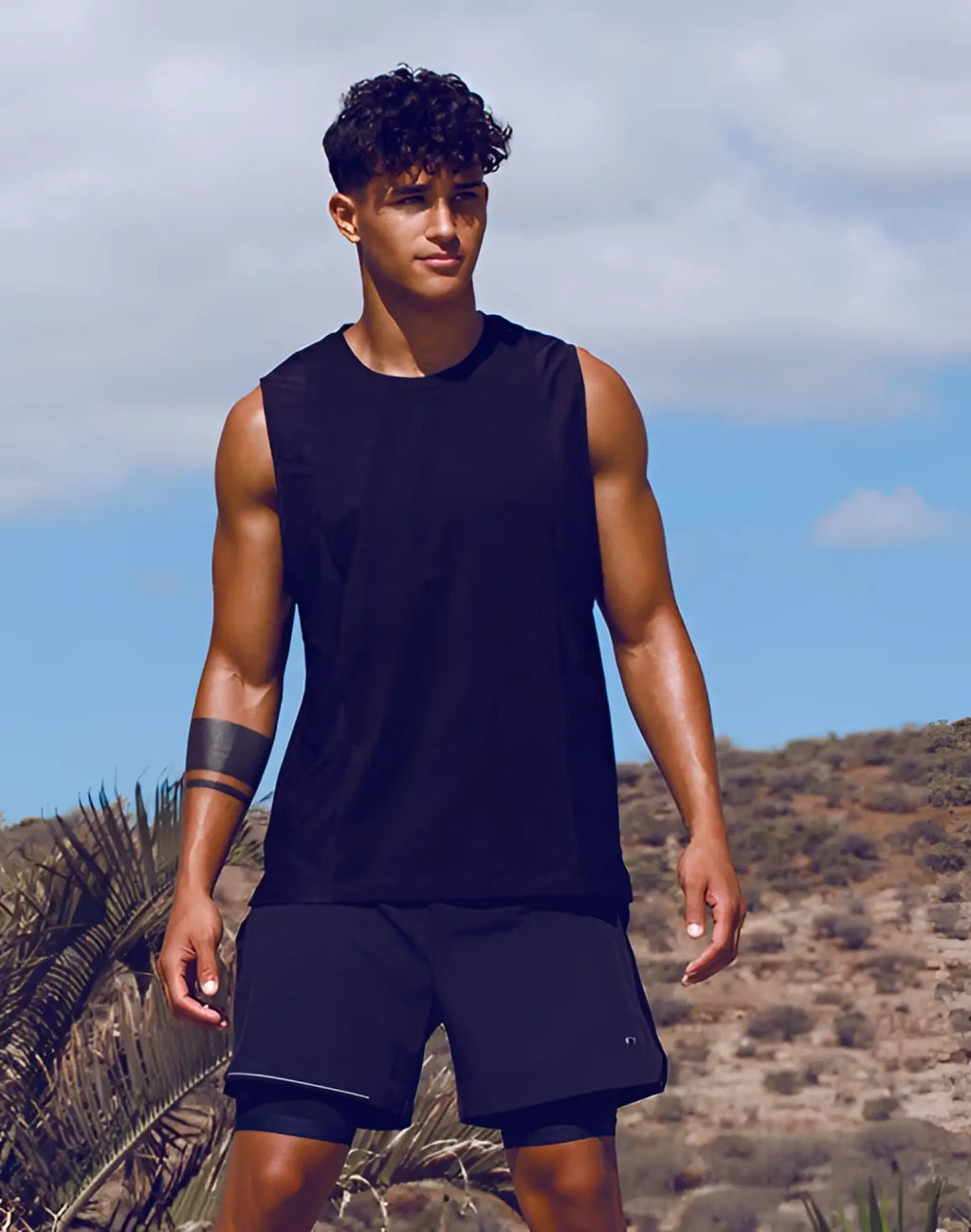 Black sleeveless supawear supa pro singlet with round neckline and subtle seam detailing for athletic use