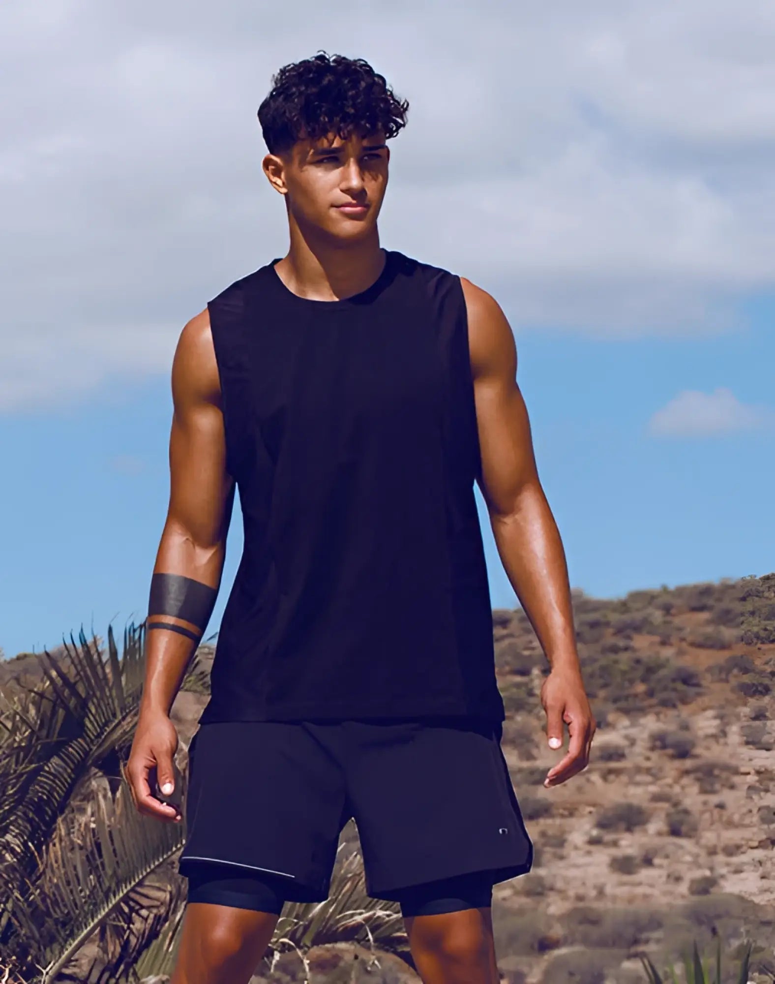 Black sleeveless supawear supa pro singlet with round neckline and subtle seam detailing for athletic use