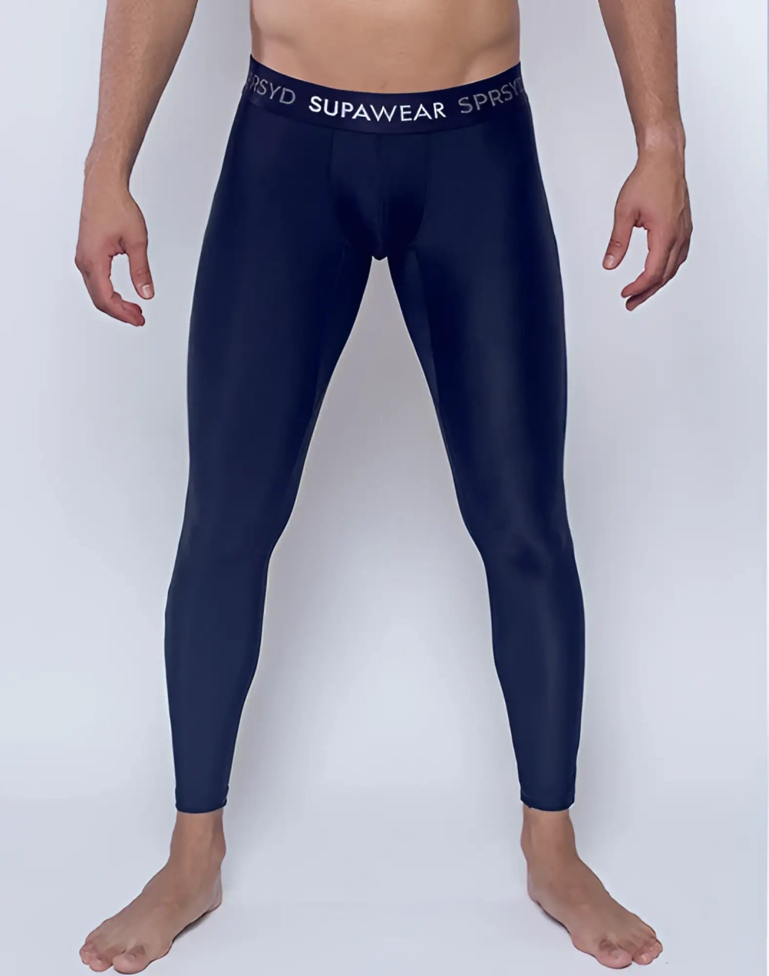 Navy blue supawear compression leggings with white elastic waistband featuring brand name for training use