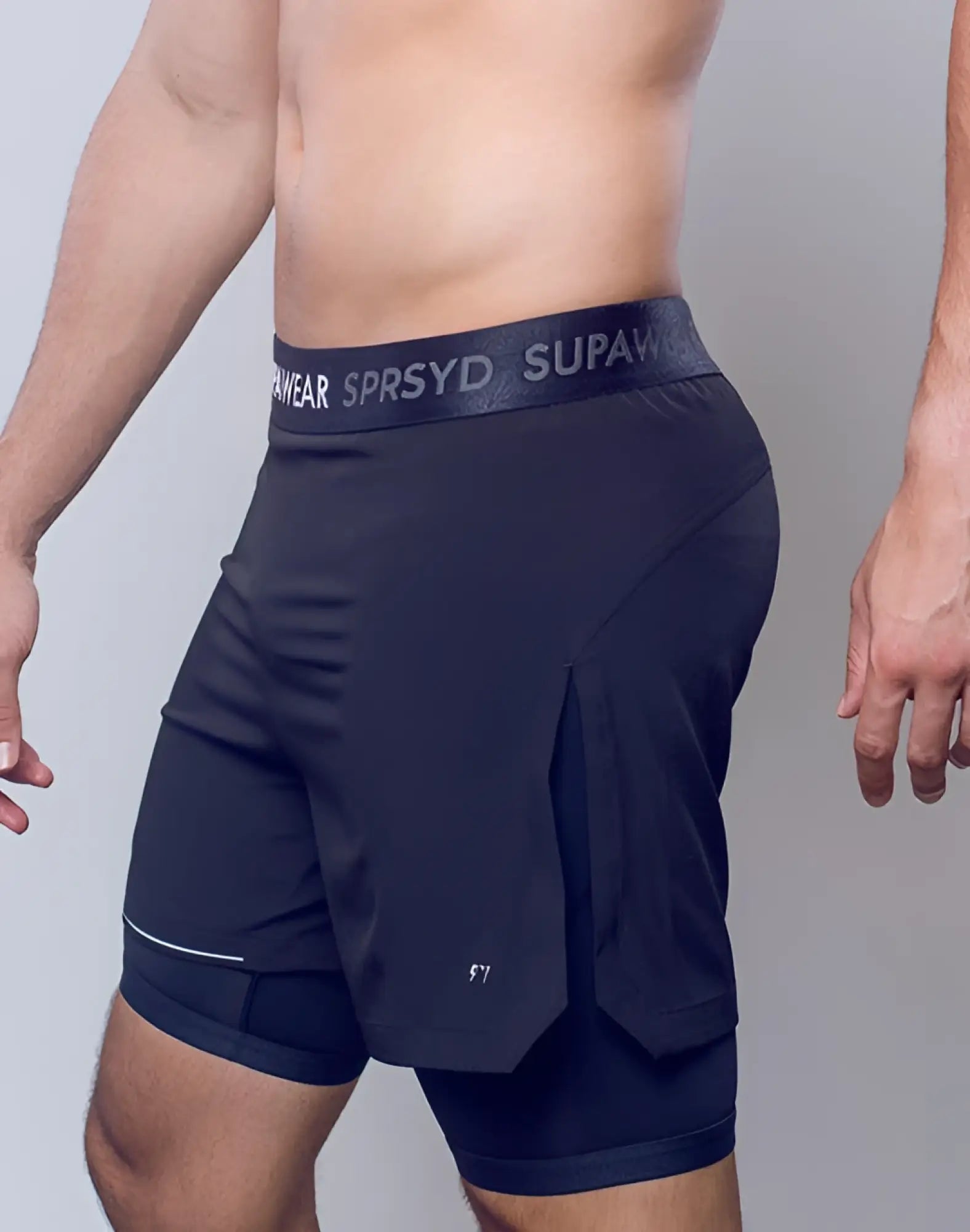 SupaWear Supa Pro workout shorts in black with textured waistband featuring white lettering and subtle side pockets