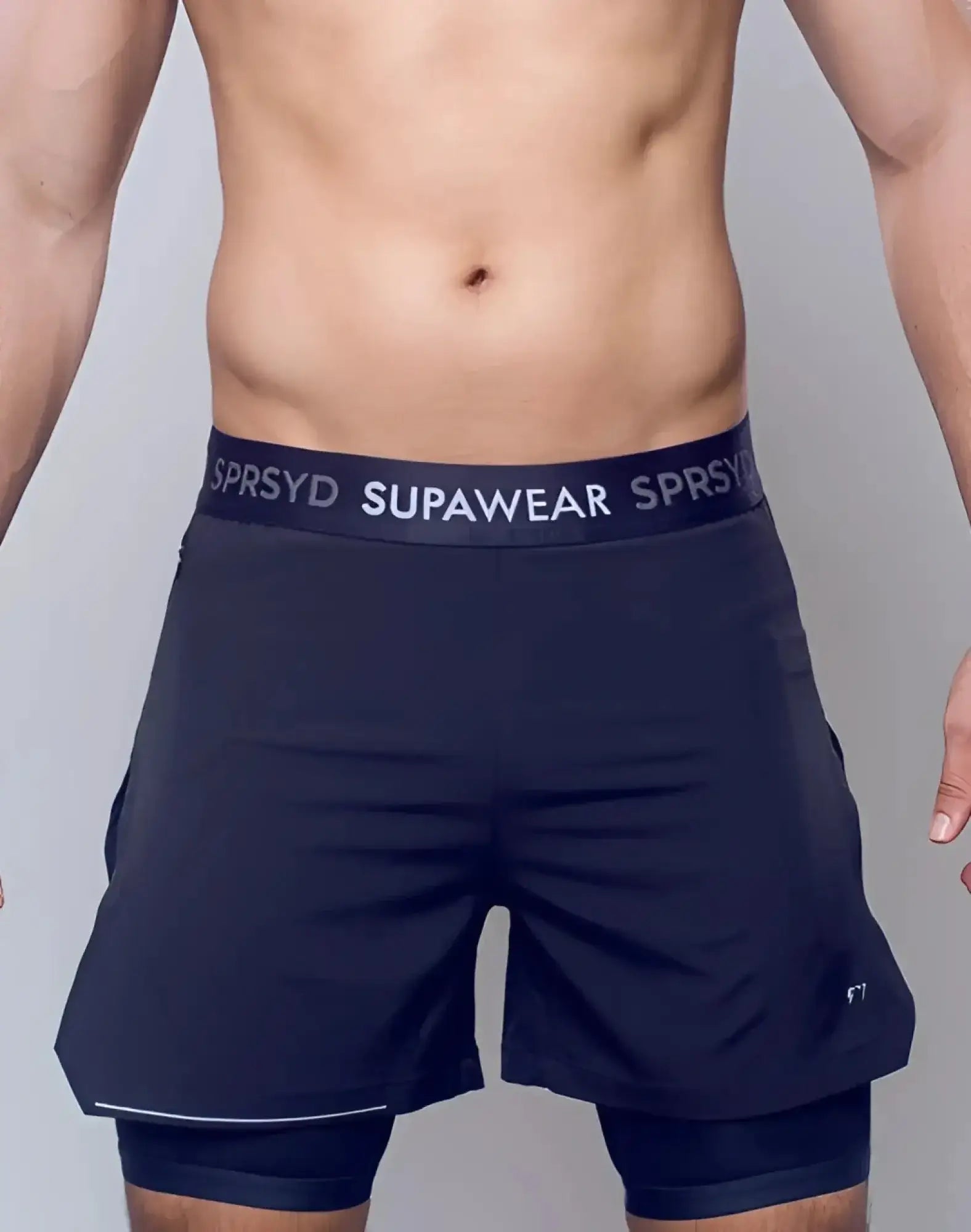 Black supawear supa pro workout shorts with contrasting white waistband and subtle side panel detailing