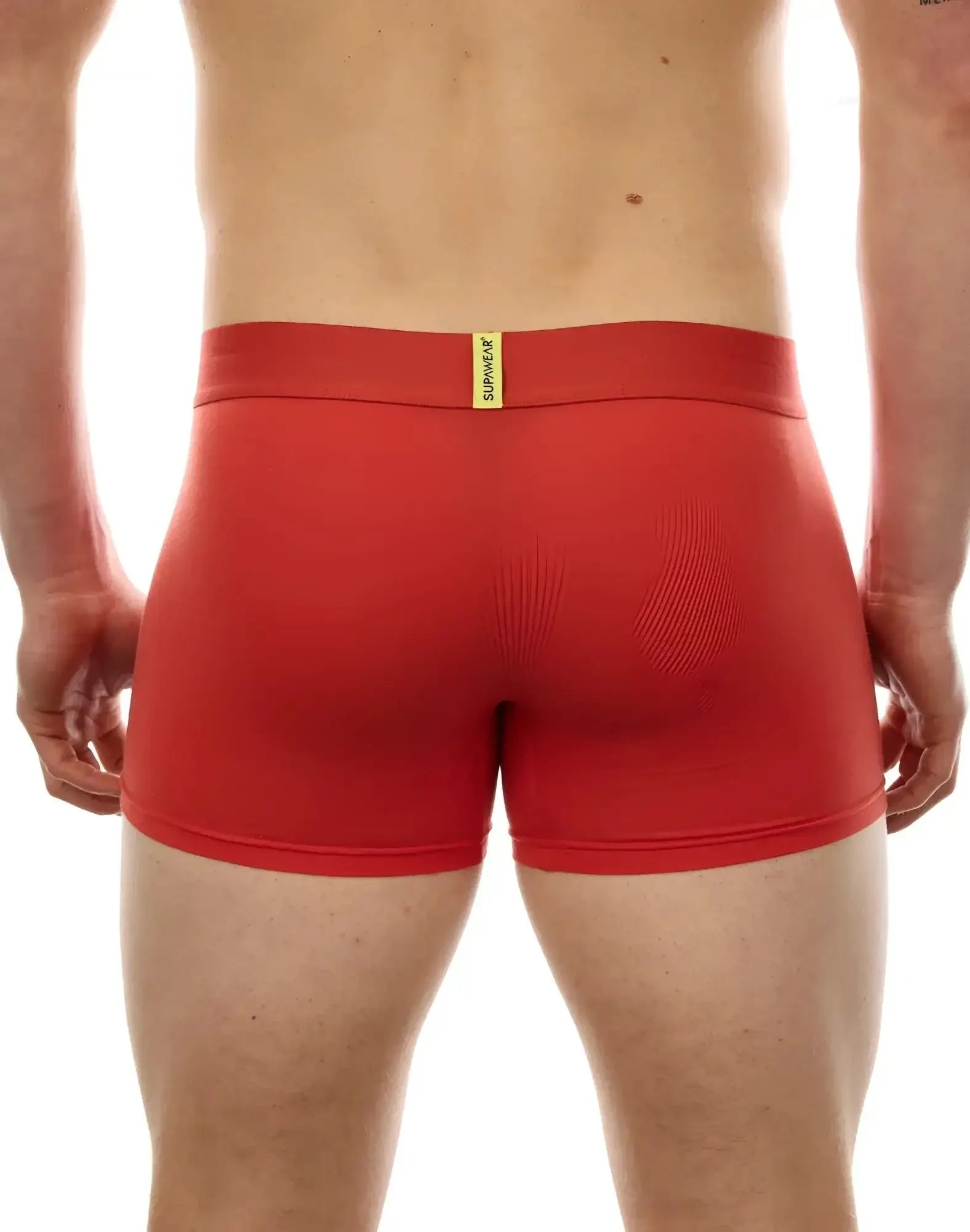 Red supawork boxer briefs with yellow supawear tag on waistband designed for comfort and support