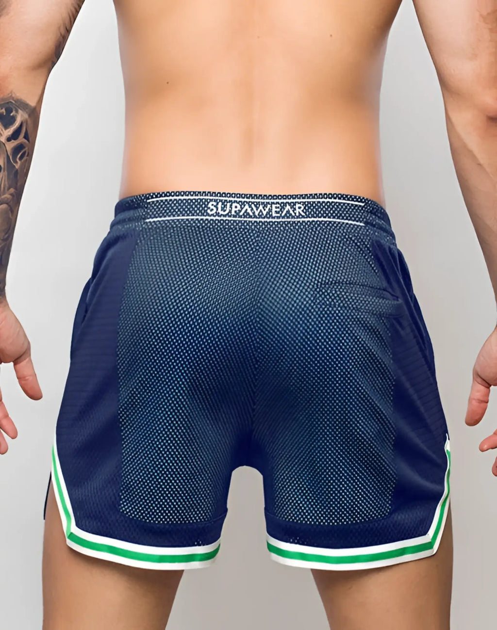 Navy blue supawear swish mesh shorts with neon green and white trim and supawear waistband label