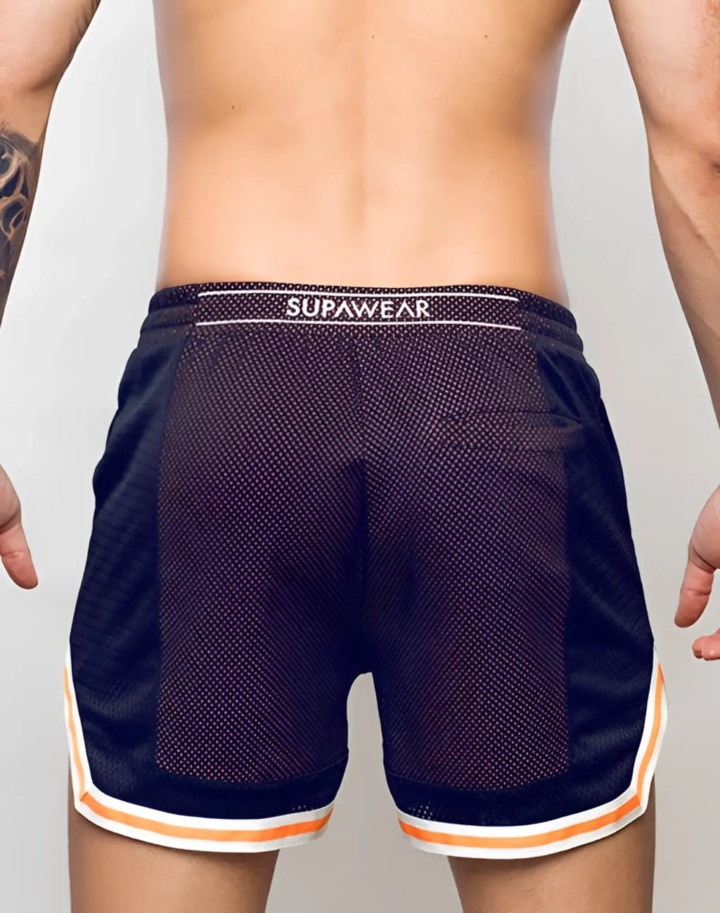 Black mesh supawear swish shorts with neon orange and white trim and supawear waistband for athletic use