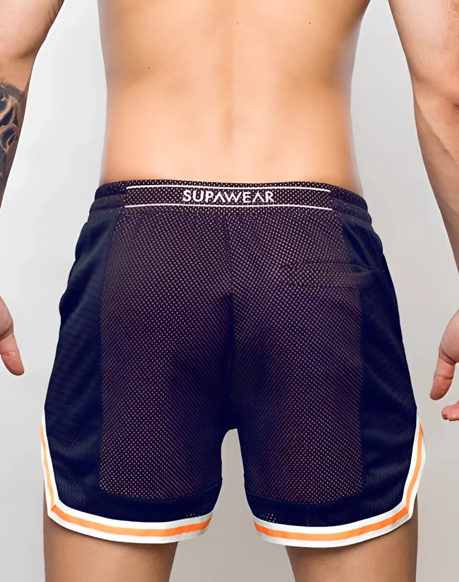 Black mesh supawear swish shorts with neon orange and white trim and supawear waistband for athletic use