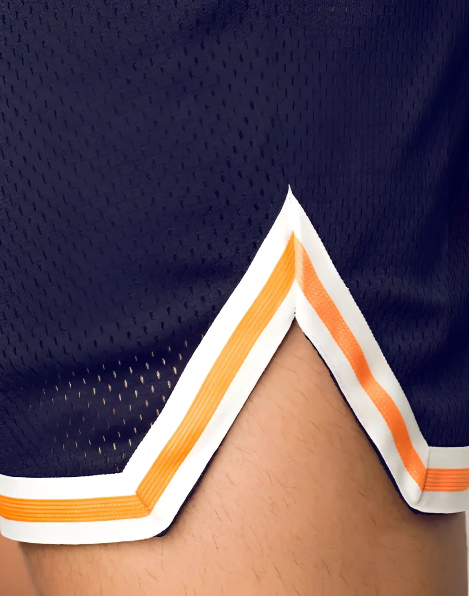 Navy blue supawear swish mesh athletic shorts with white and orange striped hem for sporty casual wear