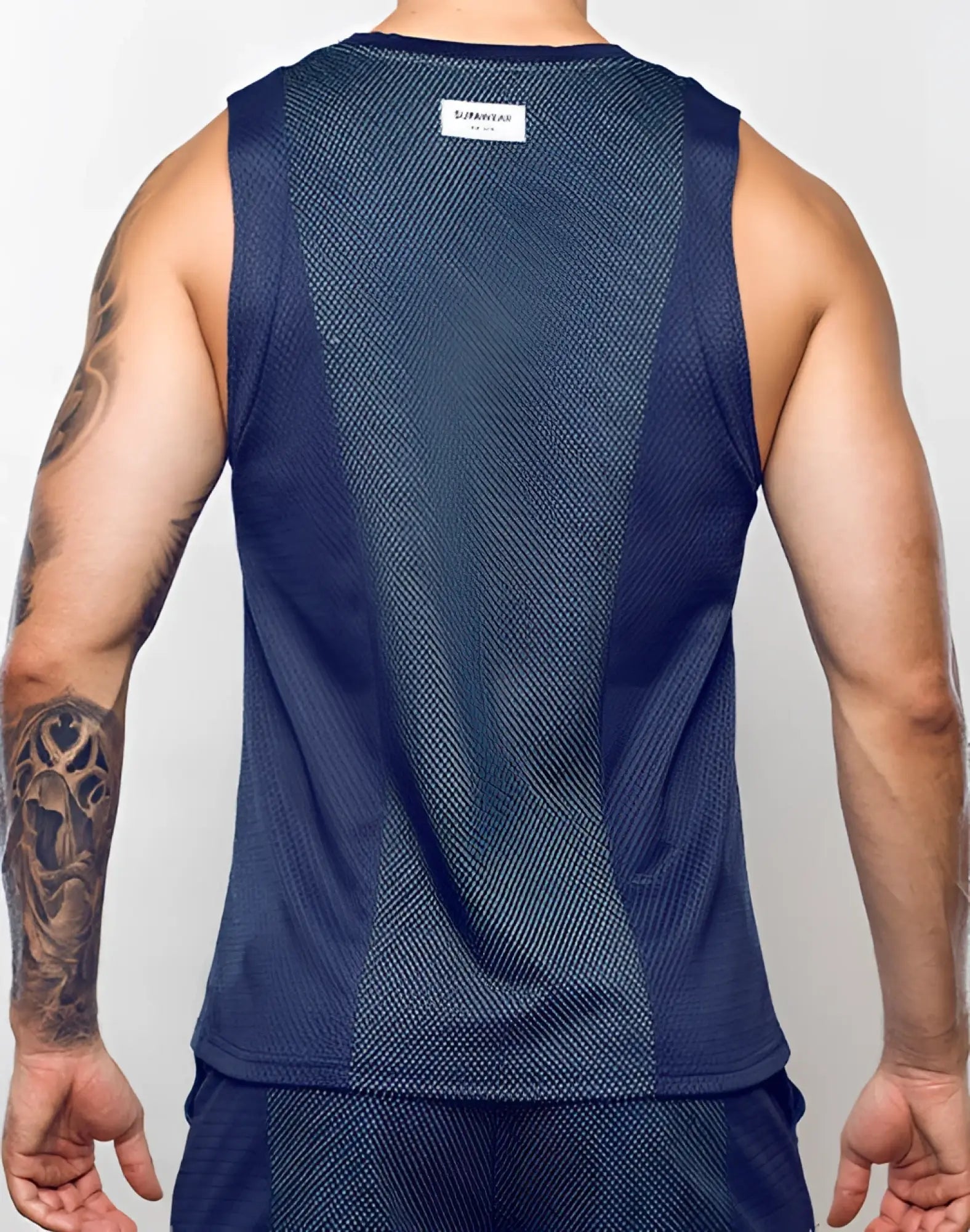 Navy blue mesh athletic tank top with subtle gradient and white supawear label at neckline from swish mesh singlet neon green collection