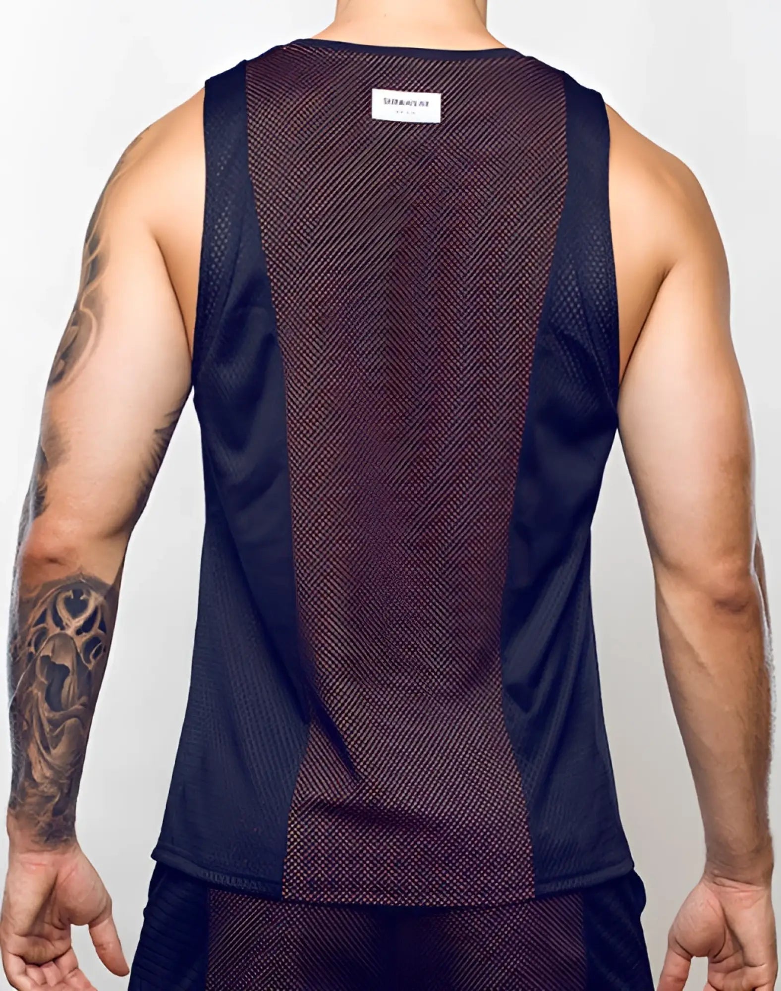 Dark navy supawear swish mesh singlet tank top with brownish mesh back panel and white brand tag at neckline