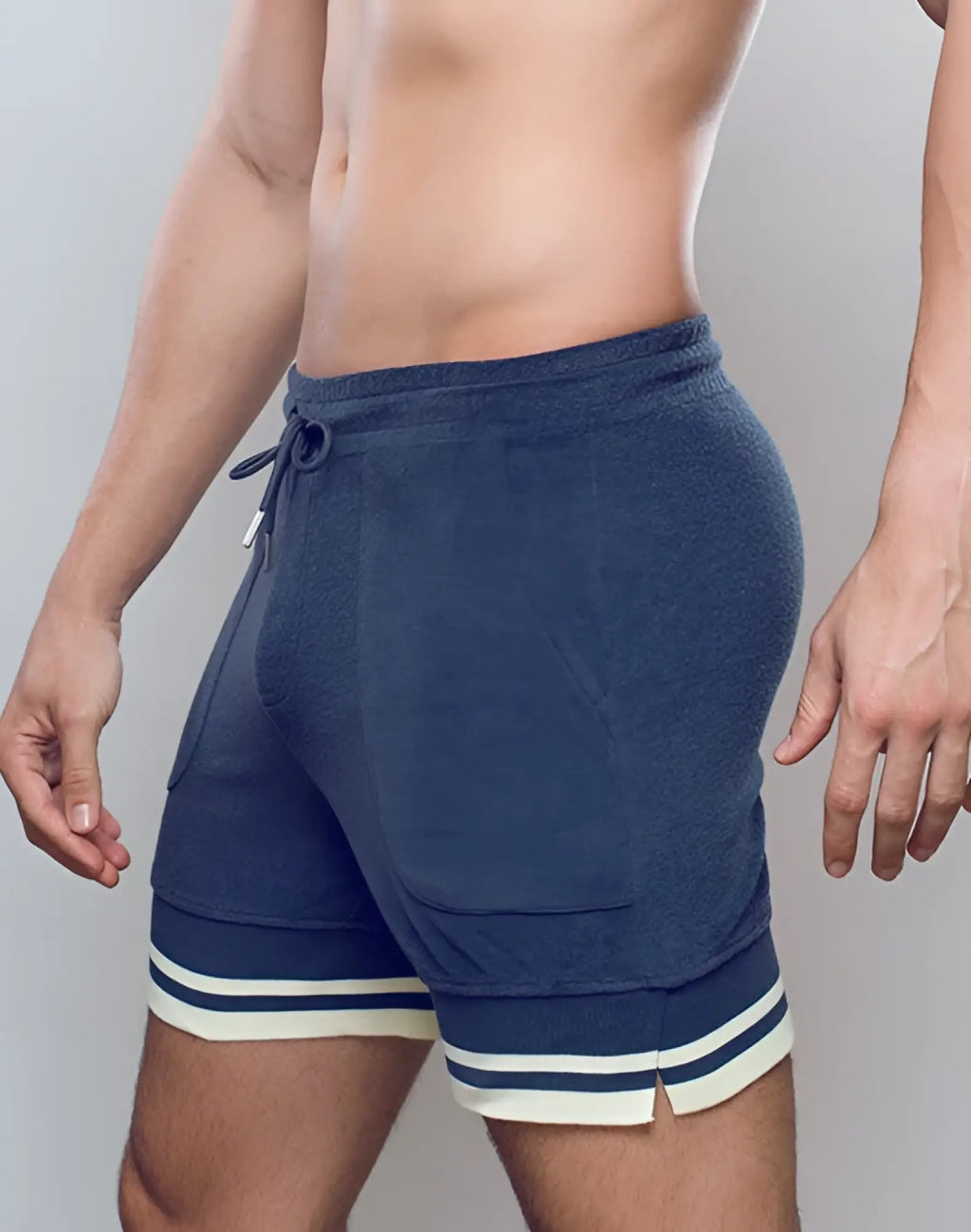 Navy blue supawear terry towelling athletic shorts with white and dark blue striped cuffs