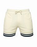 SupaWear cream-colored terry towelling athletic shorts with navy blue striped cuffs and matching drawstring waistband