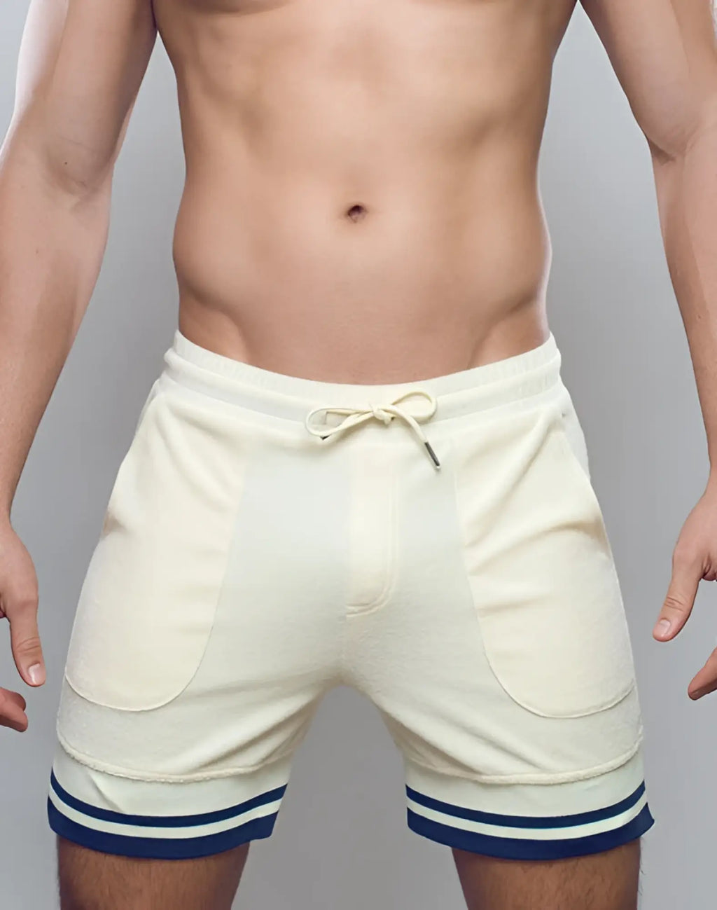 SupaWear off white terry towelling shorts with cream color, navy blue striped cuffs, and matching drawstring waistband