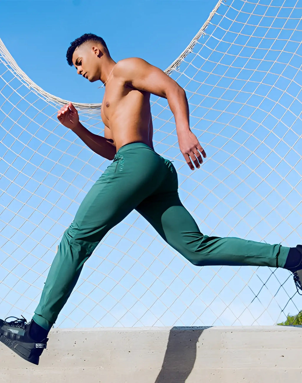 SupaWear training pants in nexus dark green with a slim fit design for athletic and casual wear