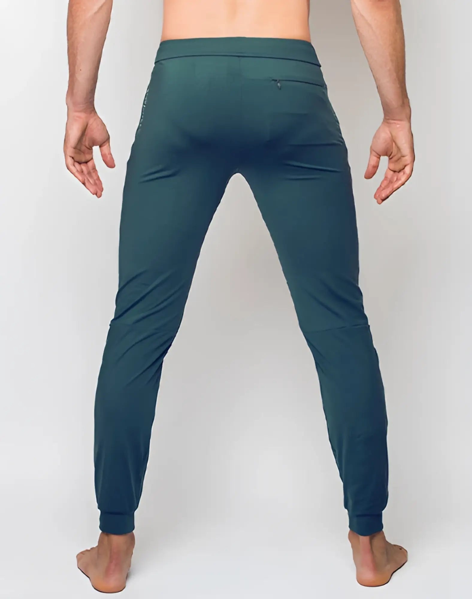 SupaWear training pants in nexus dark green dark teal athletic joggers with sleek form fitting design and subtle side pockets