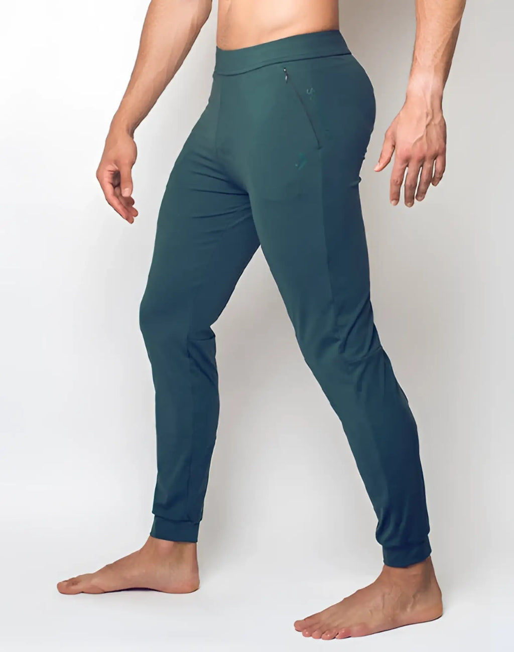 SupaWear training pants Nexus dark green dark teal athletic joggers with sleek form fitting design and subtle side pockets