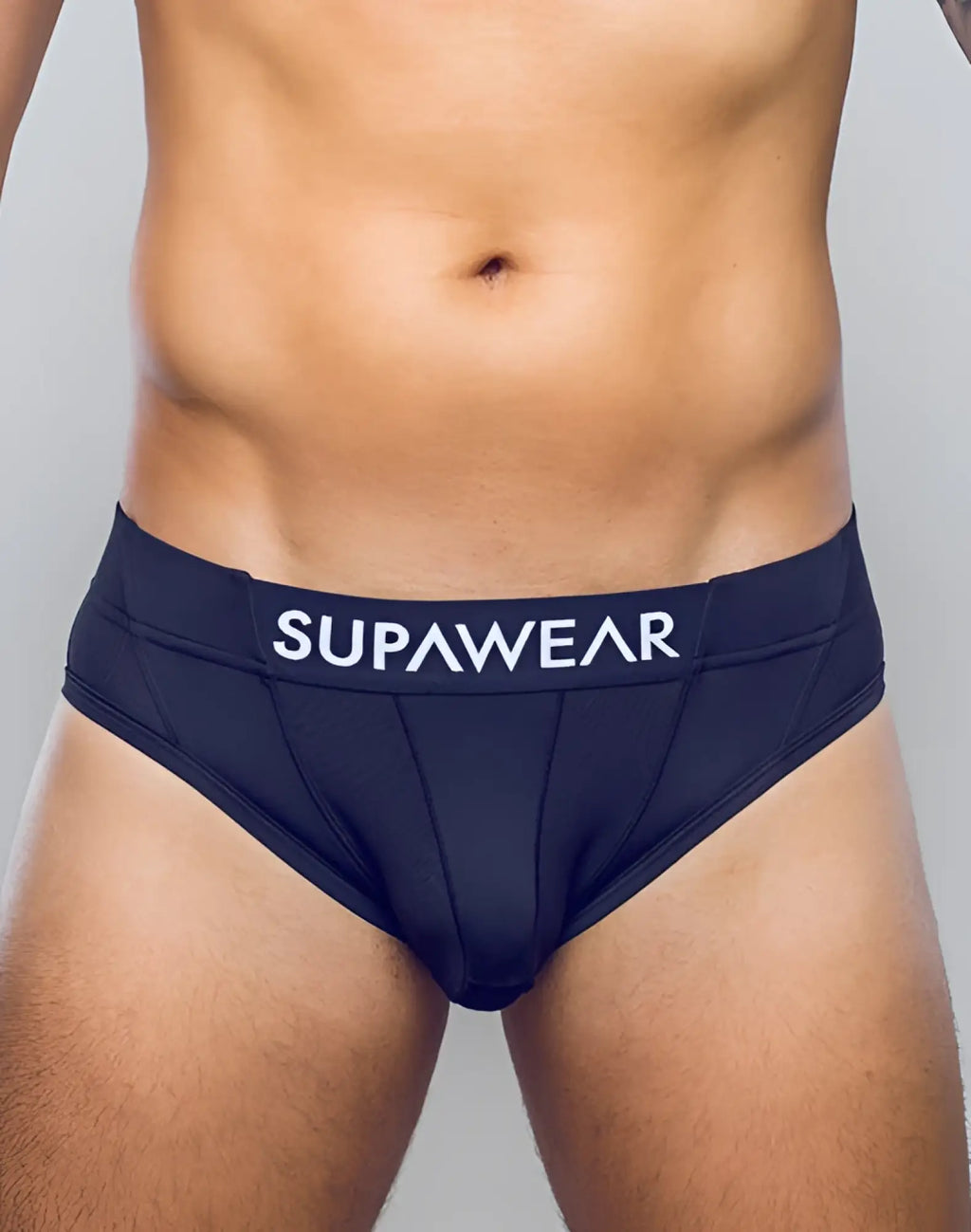 Navy blue supawear vortex brief underwear with white logo band designed for comfort and support in active use