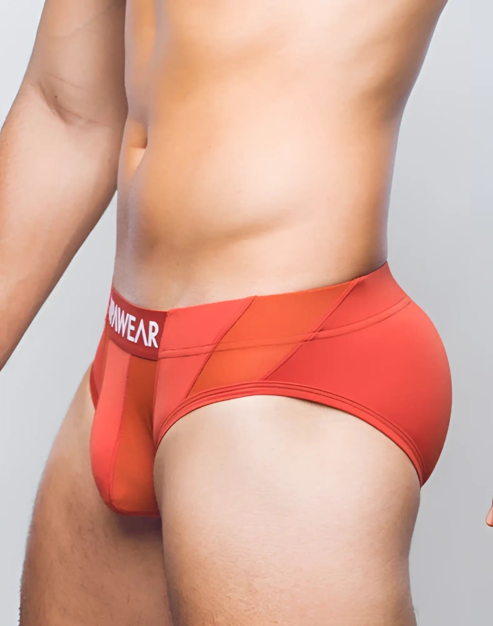 Red men’s SUPAWEAR Vortex brief underwear in cranberry with mesh panel and anwear logo waistband