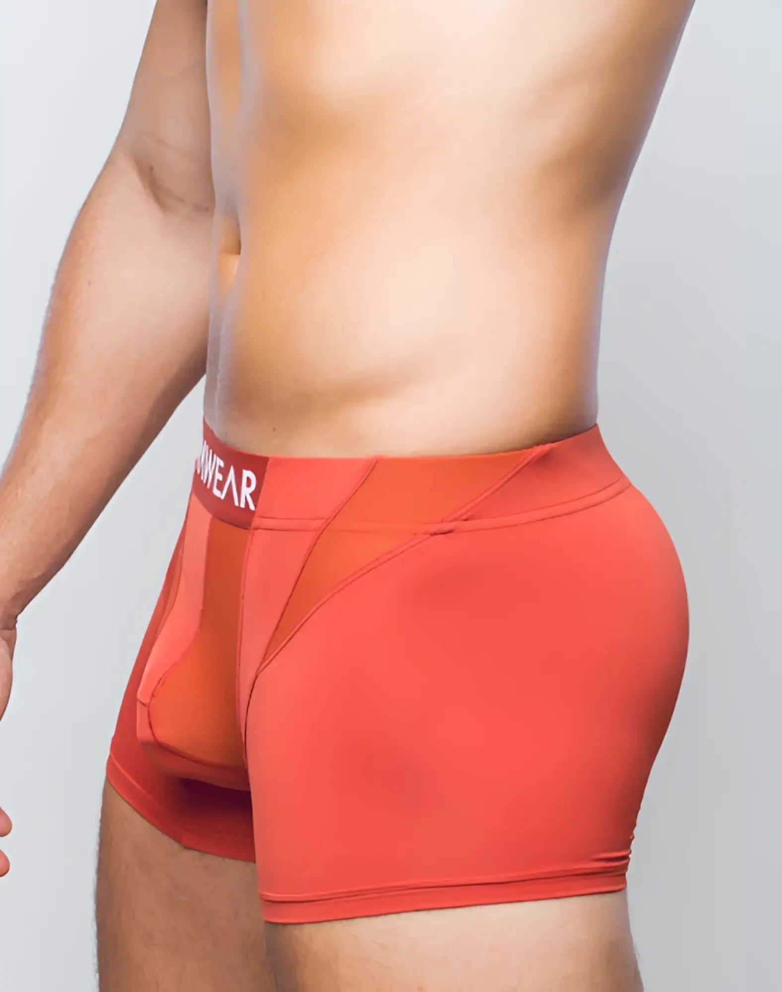 Orange supawear vortex trunk underwear with mesh panel and white branding on waistband in cranberry color