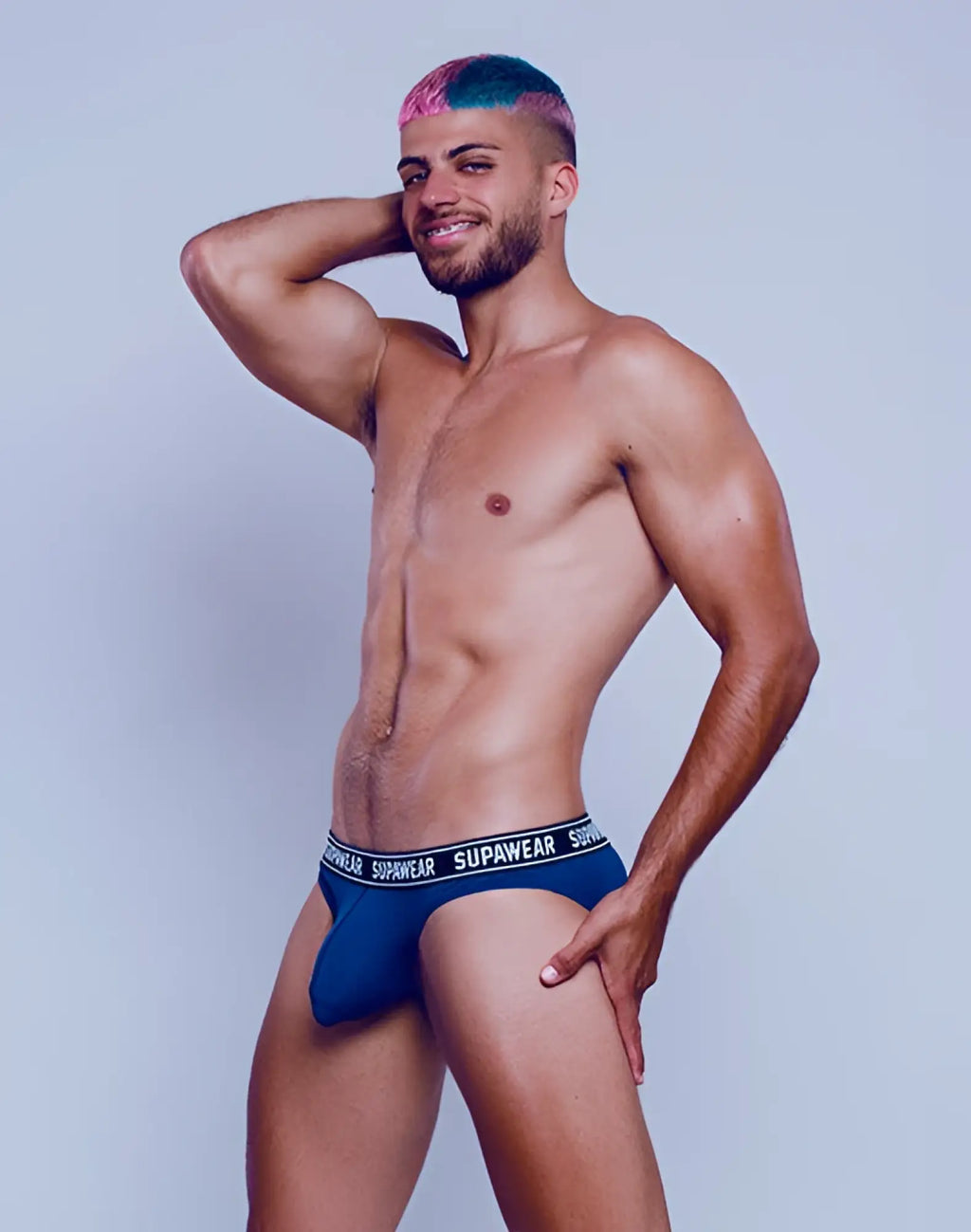 Navy supawear wow briefs with white elastic waistband featuring black brand lettering for comfortable underwear use