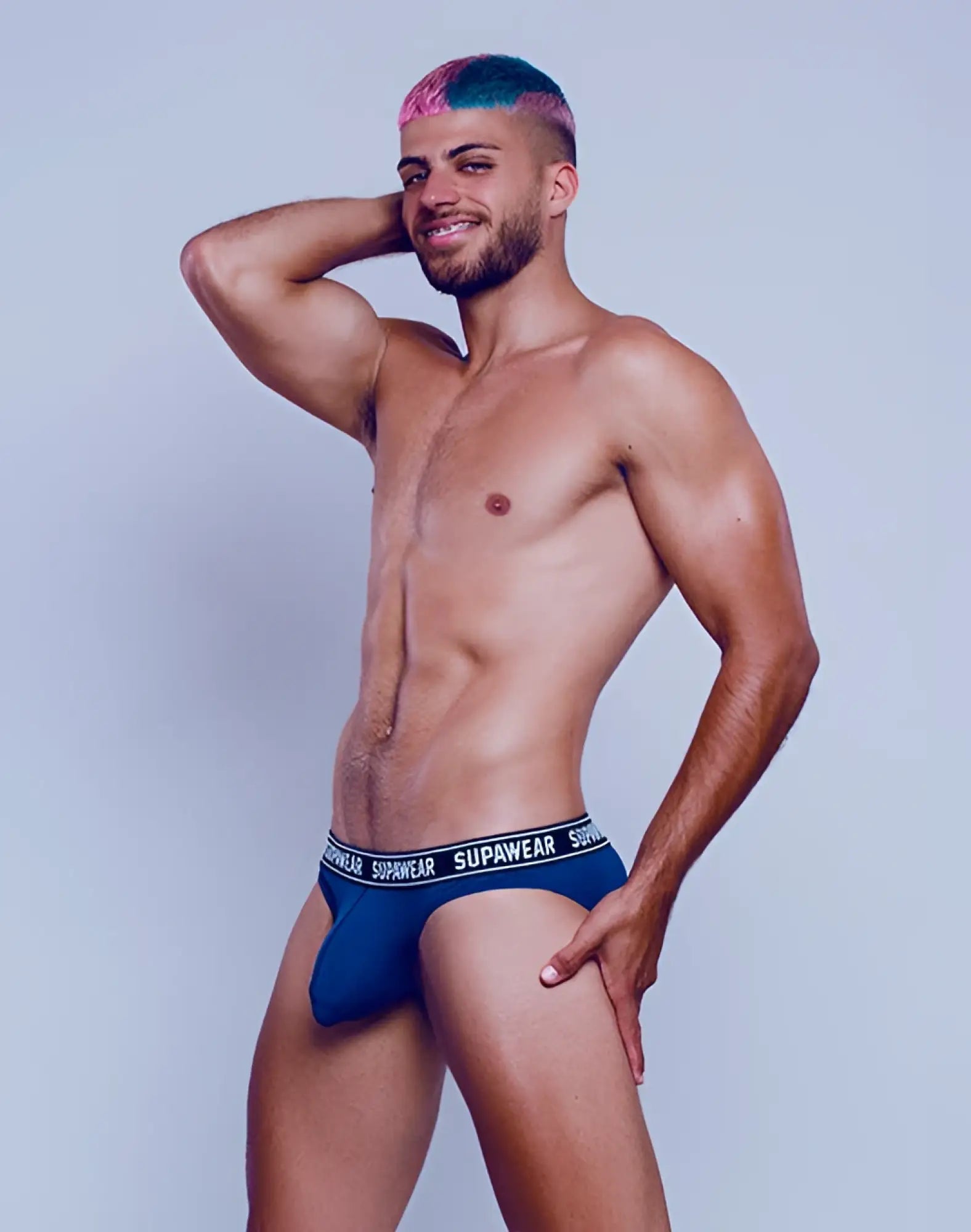 Navy supawear wow briefs with white elastic waistband featuring black brand lettering for comfortable underwear use