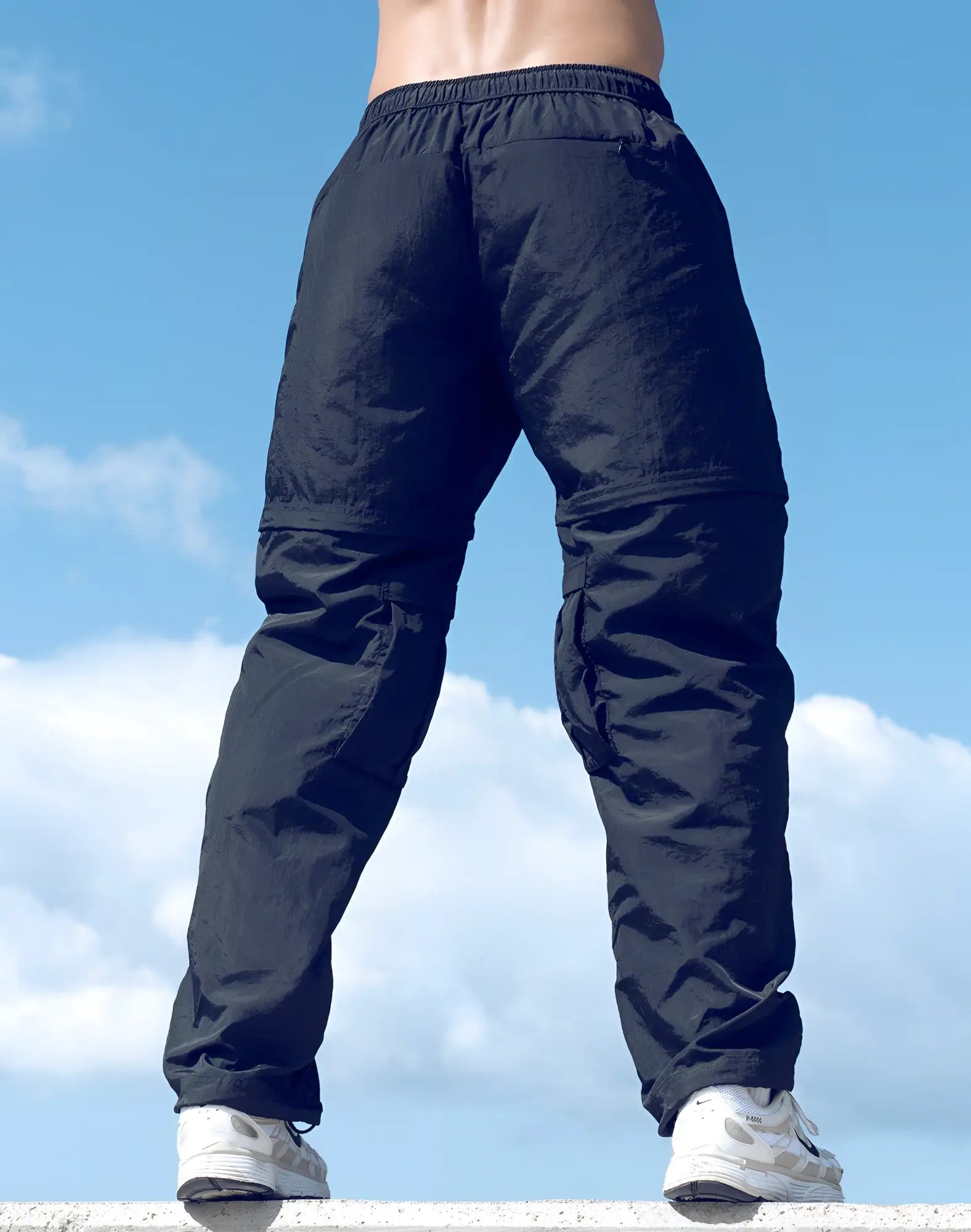 Black supawear zip-off trouser with elastic waistband and multiple pockets designed for versatile wear