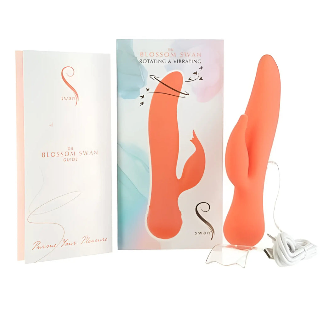 Orange silicone swan-shaped swan blossom rabbit vibrator with rotating vibrating feature and white charging cable