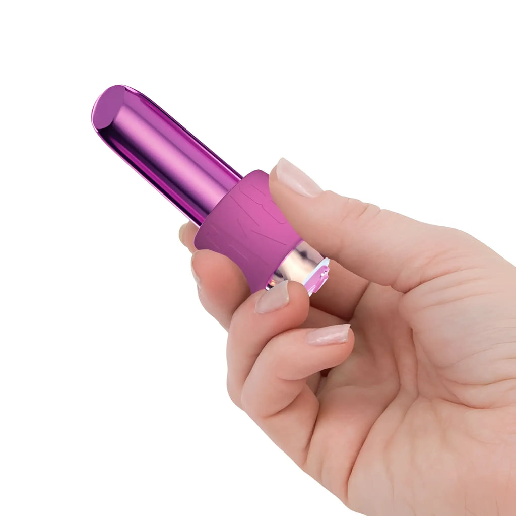 Purple metallic lipstick-shaped vibrator with textured grip and clear led light base for comfortable use