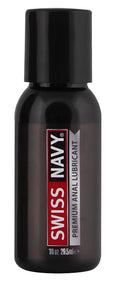 Black plastic bottle with black cap labeled swiss navy premium anal lubricant in red and white text 1oz 29ml