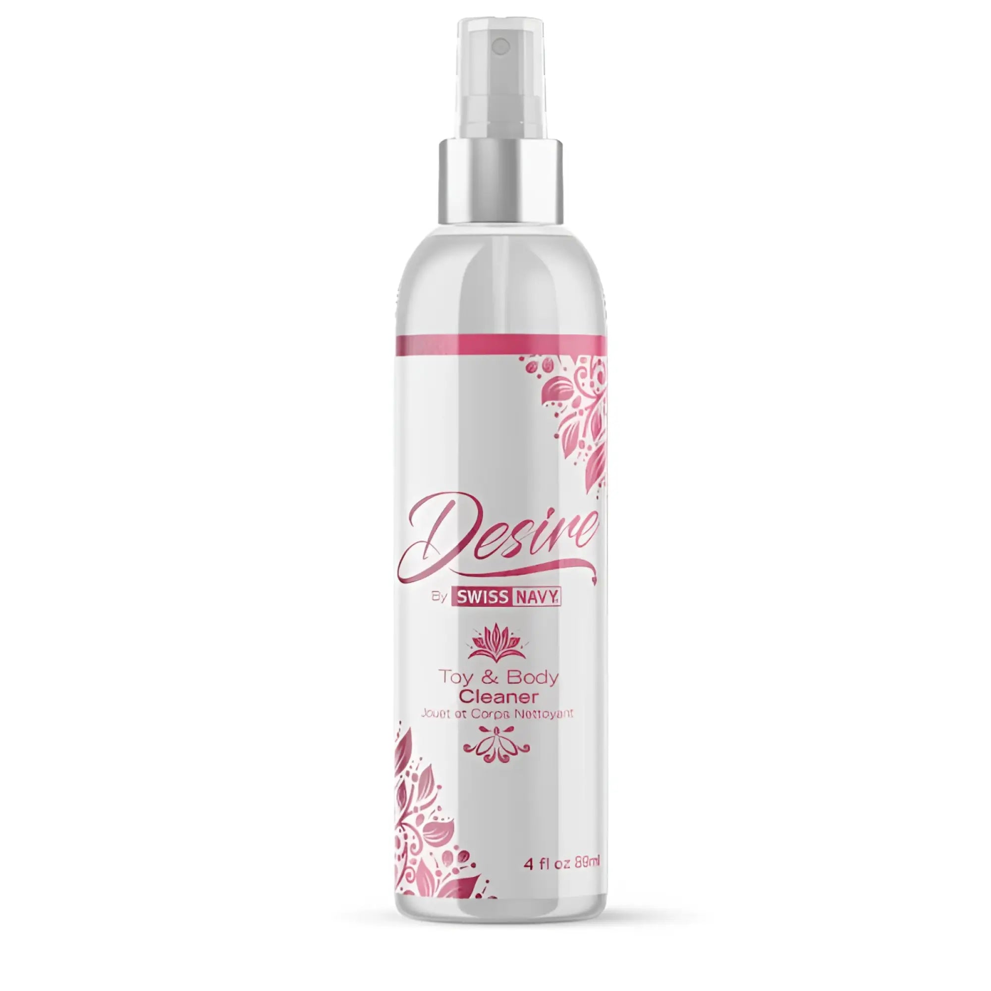 A clear plastic spray bottle with silver nozzle and pink floral design labeled desire by swiss navy toy and body cleaner