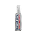 A sleek silver bottle of Swiss Navy silicone based lubricant with a white pump and bold blue and red labeling