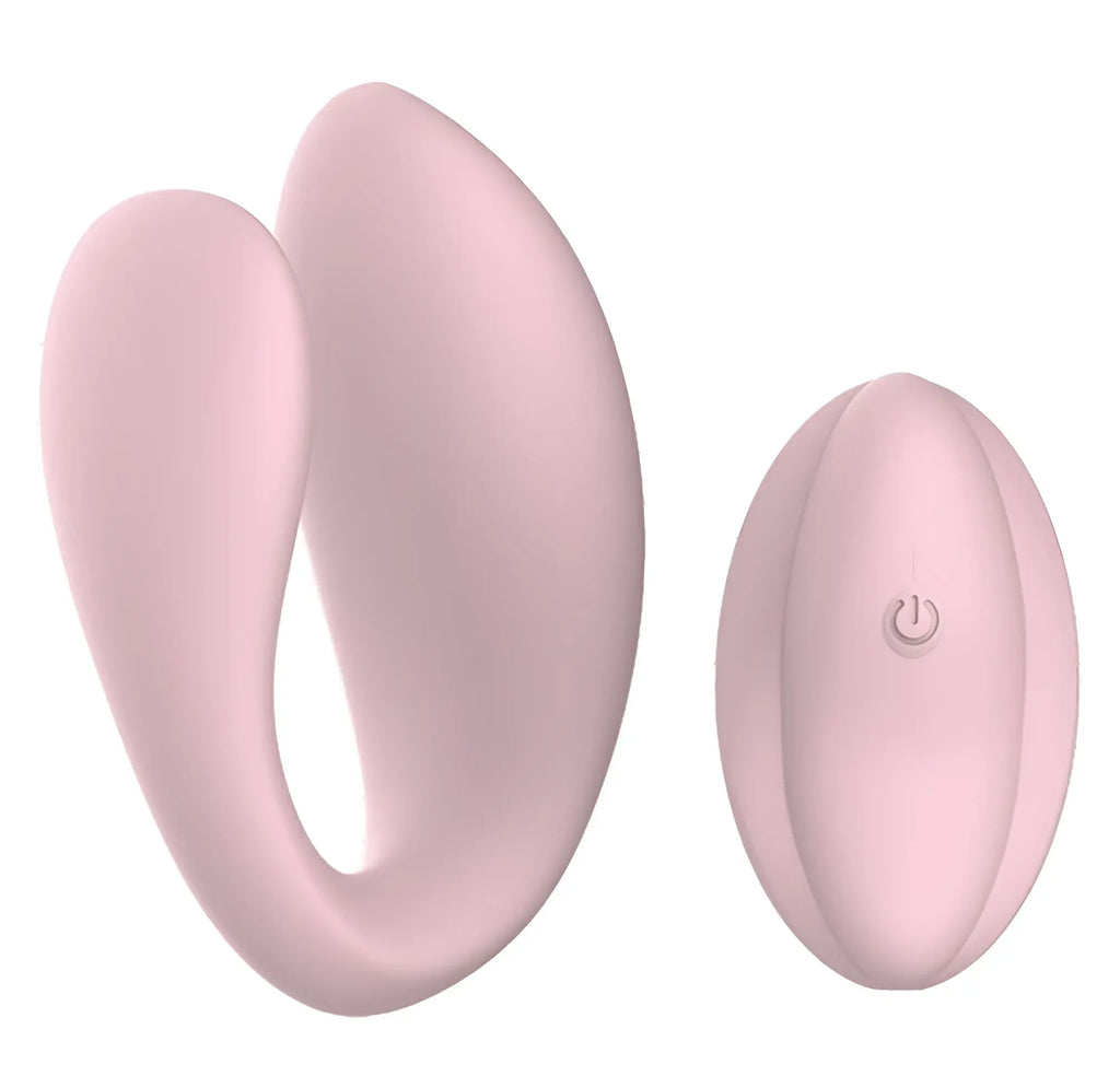 Pink silicone dual-headed vibrator with matching remote control power button sx e kiara dual motor couples massager
