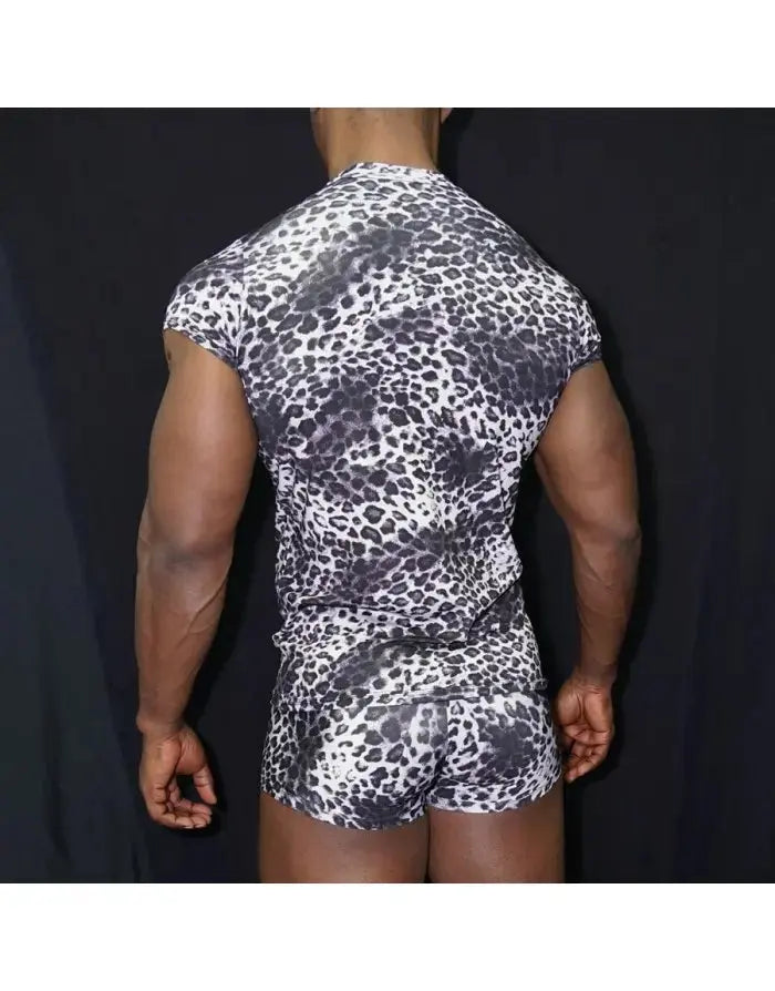 Men's extra short-sleeved leopard print t-shirt in black and white worn by a model by Arroyman.