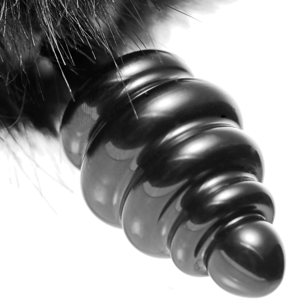 Black glossy spiral-shaped anal plug with a furry black bunny tail for playful and stylish use
