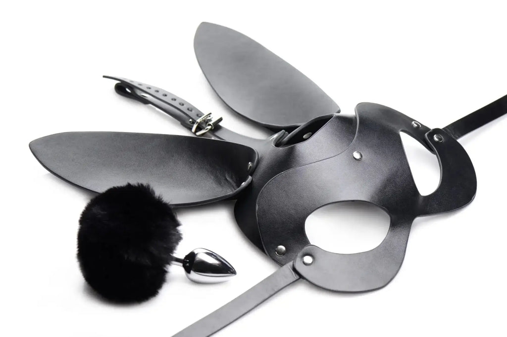 Black leather bunny mask with silver hardware and attached straps from tailz bunny tail anal plug and mask set
