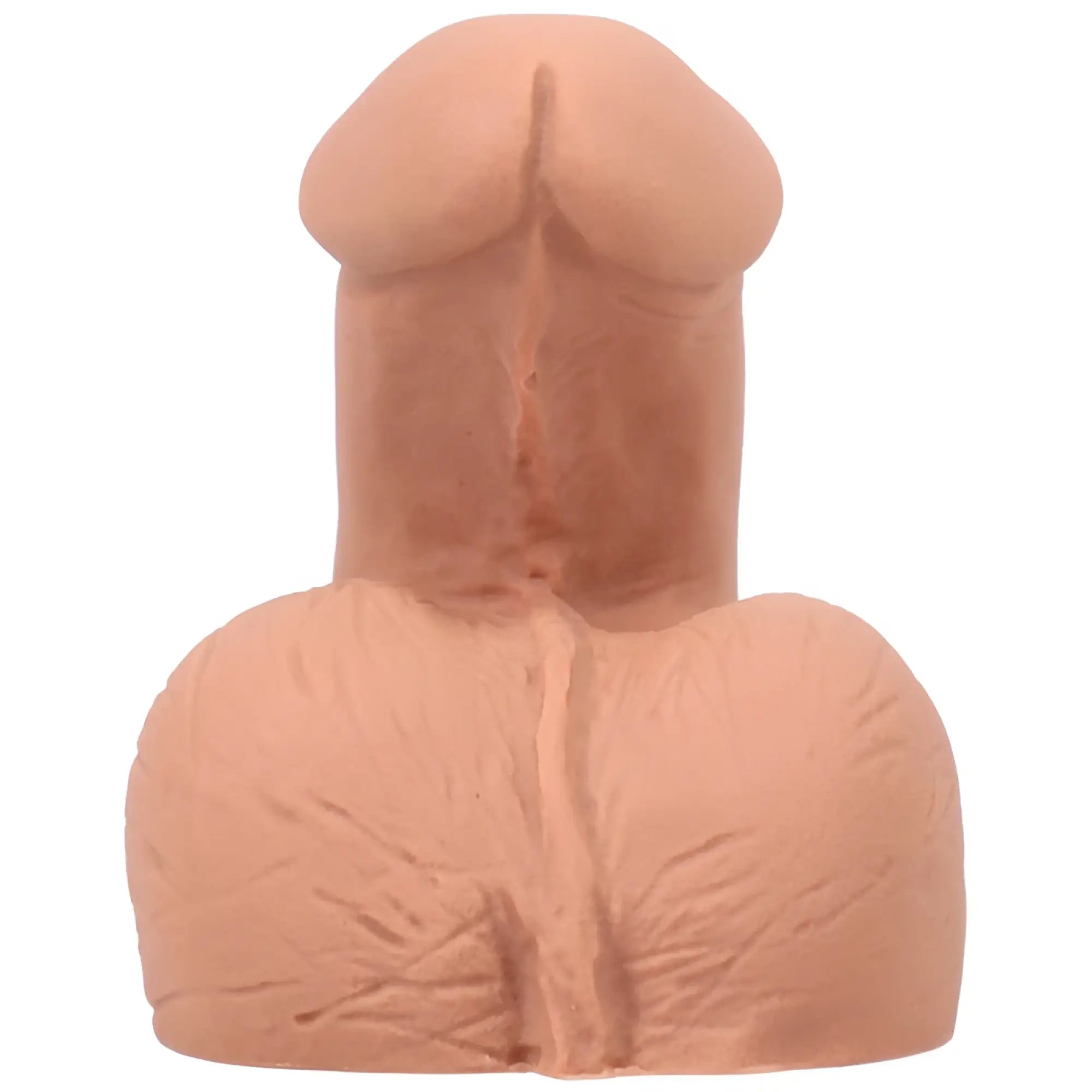 Peach-colored silicone anatomical model of male genitalia tantus on the go silicone packer honey shown from front view