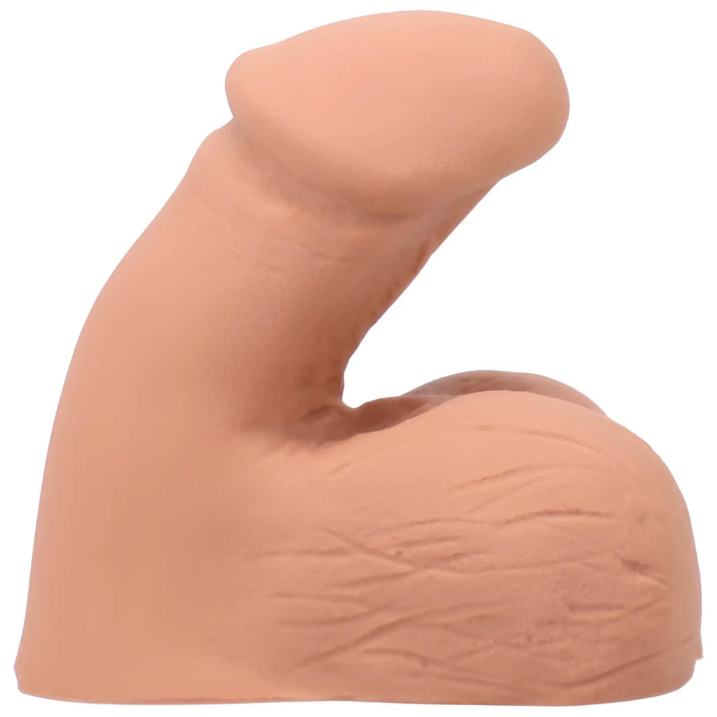 Peach-colored silicone phallic-shaped stress reliever from tantus on the go silicone packer honey collection