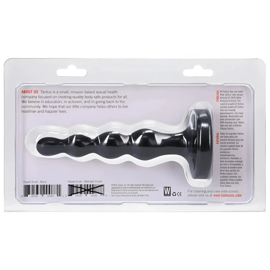 Black Tantus ripple small Onyx anal plug in clear plastic packaging showing silicone texture and shape