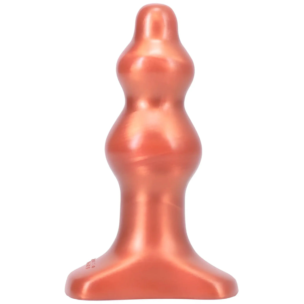 A sleek copper silicone anal plug with a smooth glossy finish and segmented design tantus severin small copper