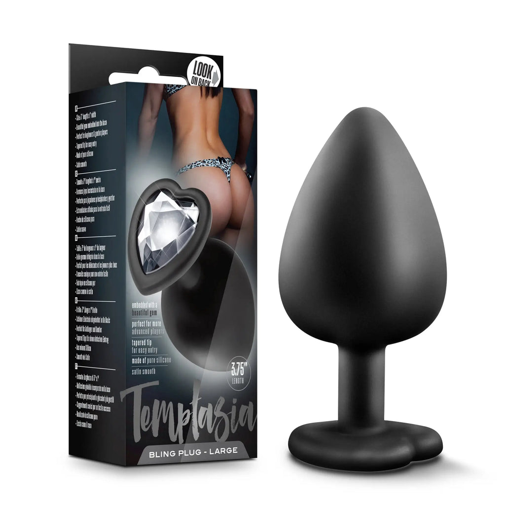 Black silicone anal plug with tapered tip and rounded base labeled temptasia bling plug large by temptasia
