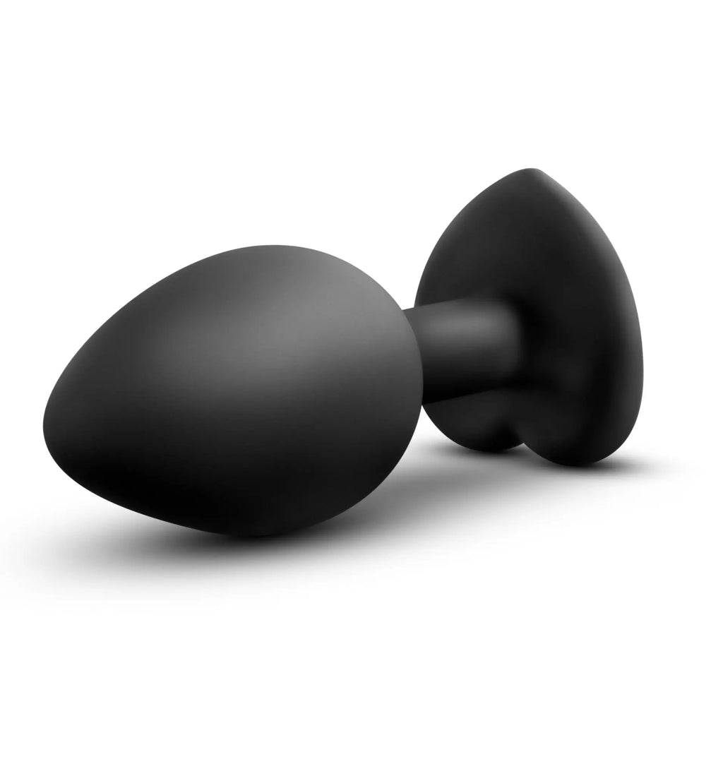 Black heart-shaped butt plug by Temptasia with smooth matte finish in small size and black color