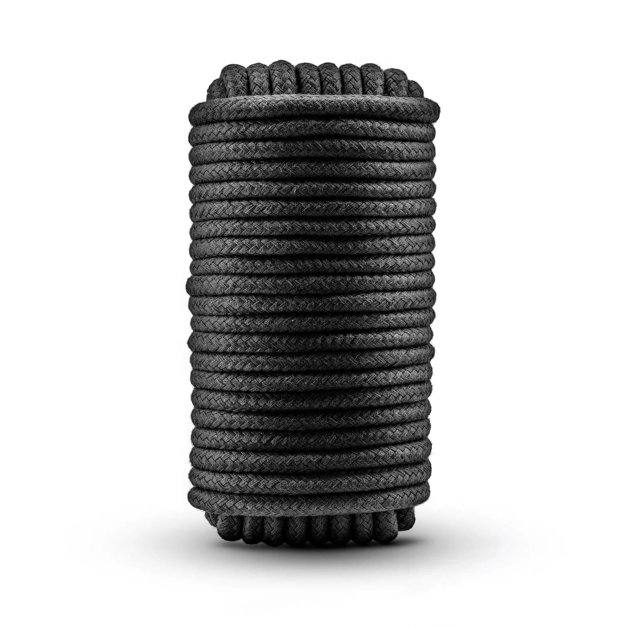 Temptasia bondage rope 10m black neatly coiled with tightly woven textured black braided material