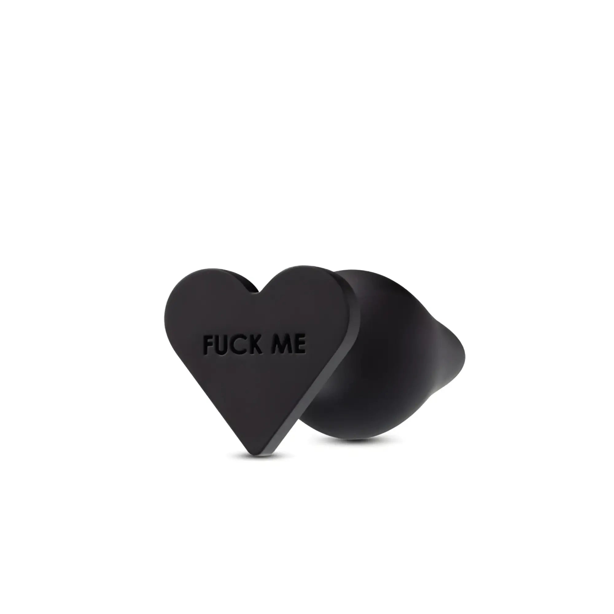 Black heart-shaped silicone anal plug engraved with fuck me from Temptasia for intimate pleasure and play