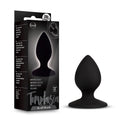 Black silicone temptasia slut plug with tapered tip and smooth rounded design for comfortable use