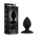 Black silicone temptasia slut plug with tapered tip and smooth rounded design for comfortable use