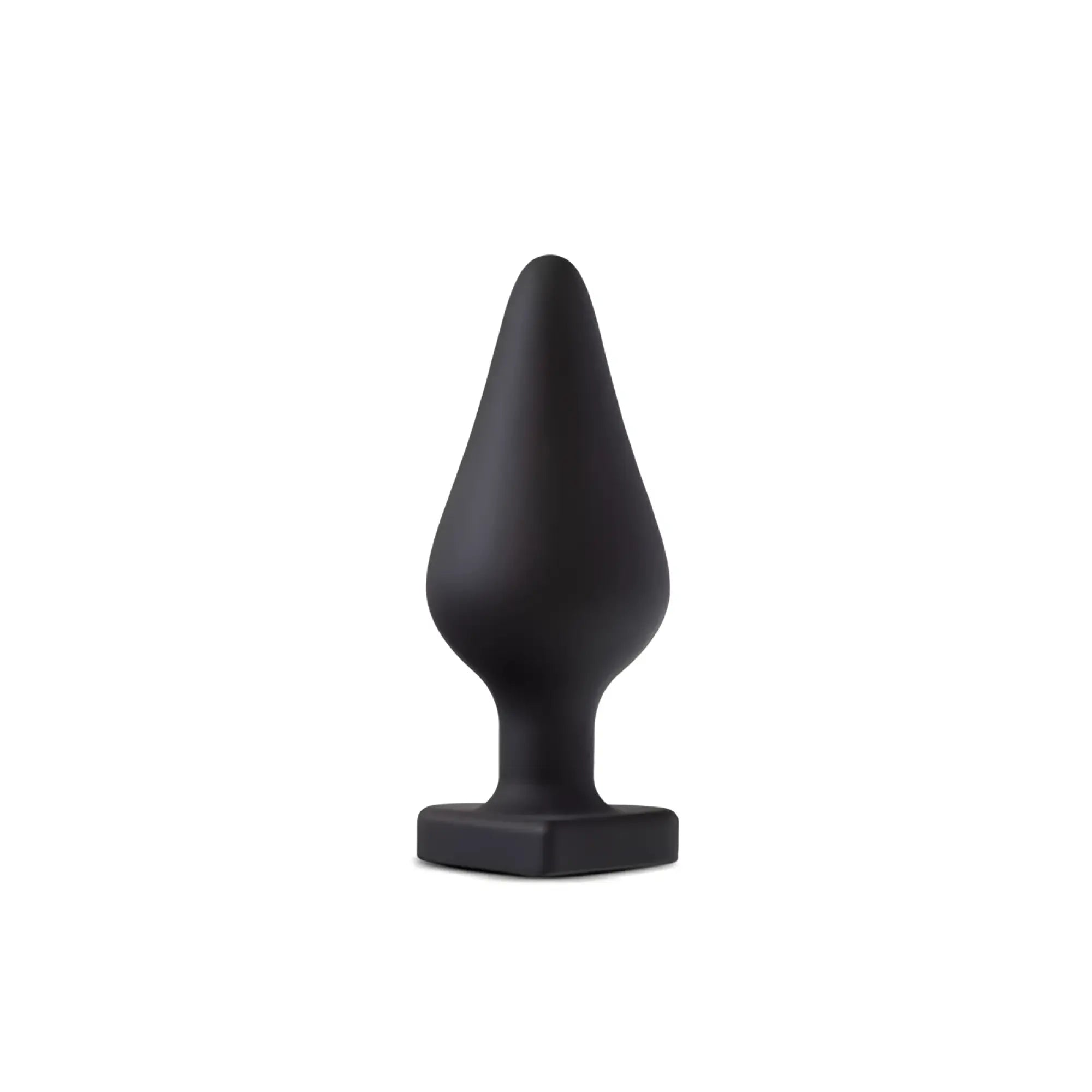 Black silicone Temptasia Spank Me butt plug with tapered teardrop head and square base for comfortable use