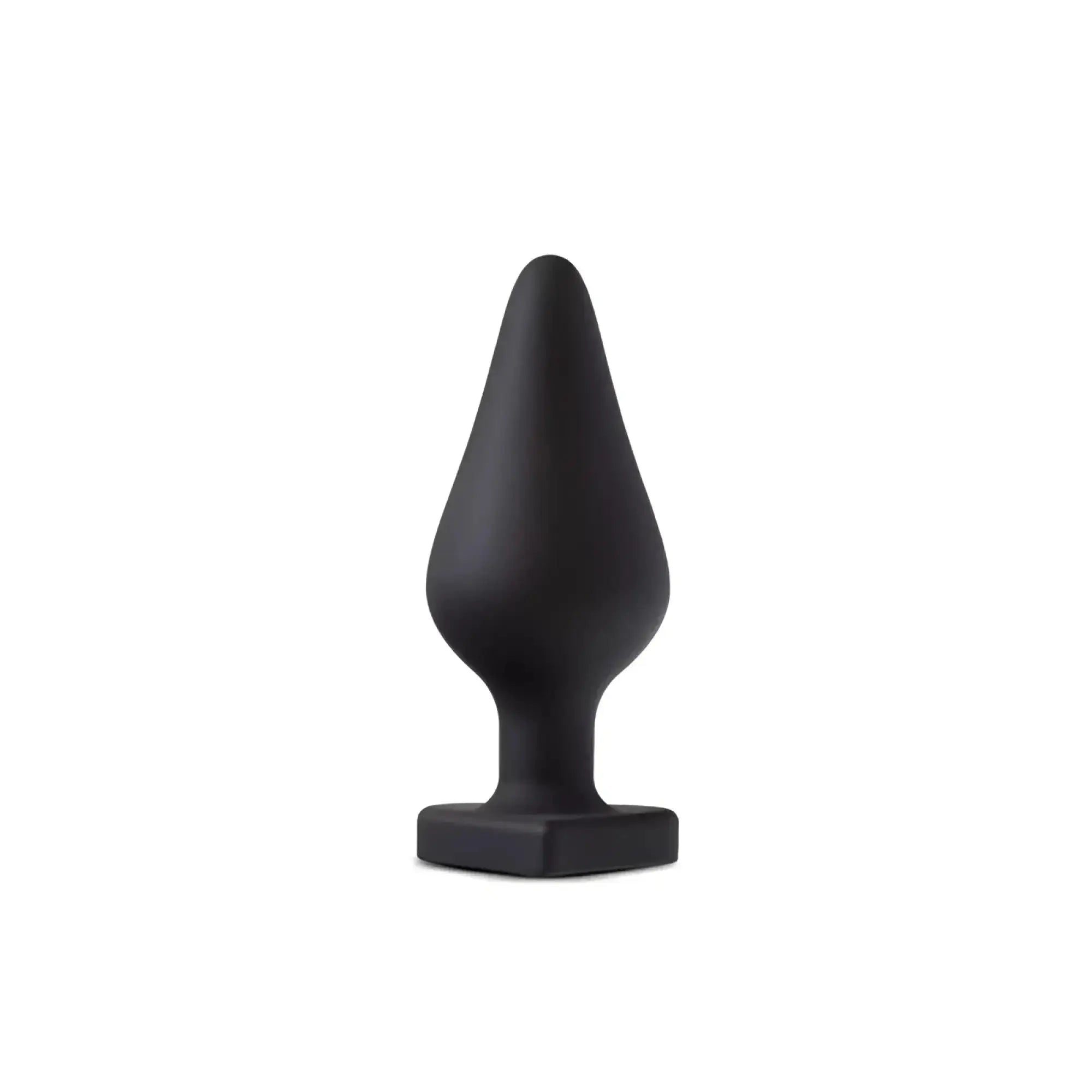 Black silicone Temptasia Spank Me butt plug with tapered teardrop head and square base for comfortable use