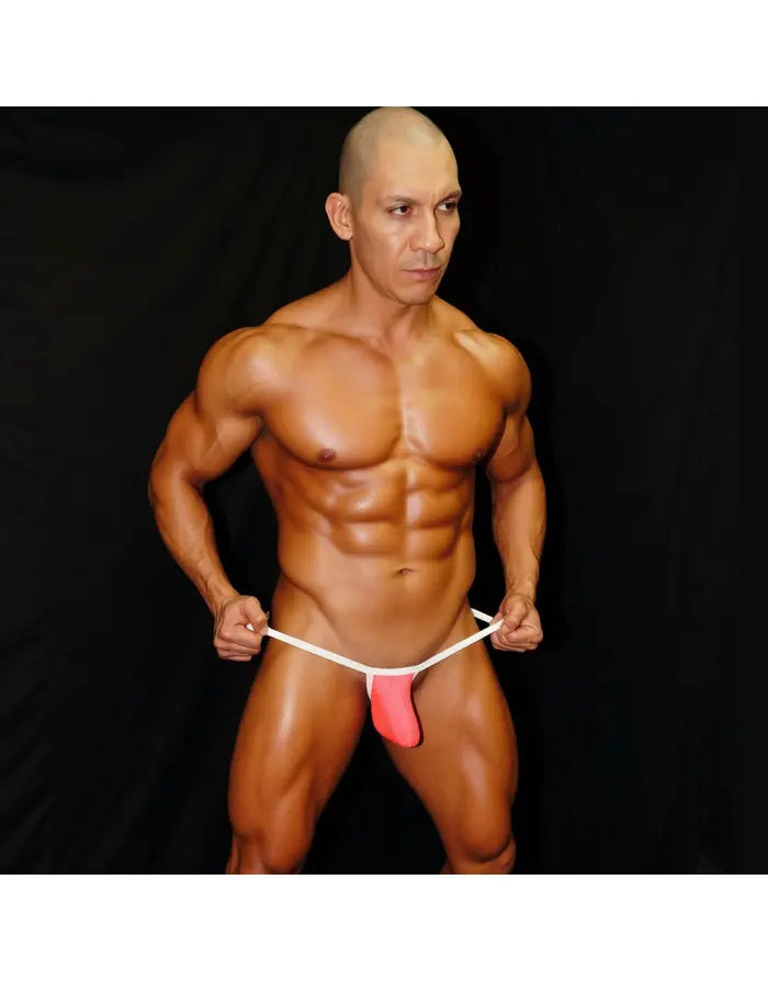 Men's pink ribbed G-string thong underwear by Arroyman featuring a minimal design and white waistband worn by a model.