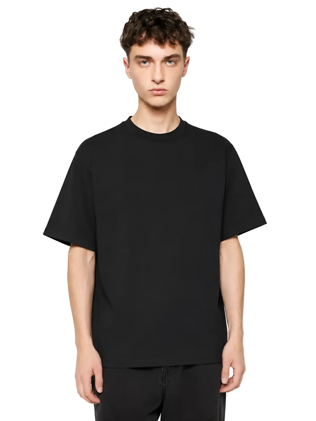 Model wearing a classic black, short-sleeve premium t-shirt with a standard crew neck, shown against a white background.