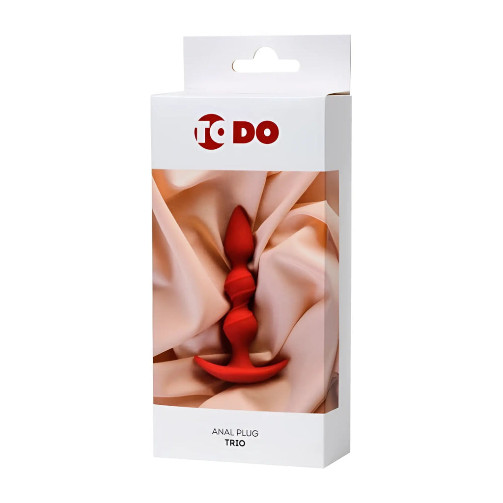 Red silicone anal plug with tapered design and flared base from todo anal plug trio product line