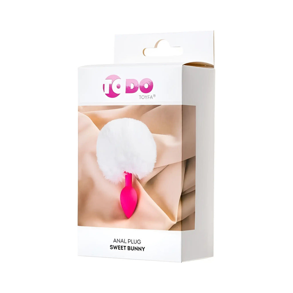 Pink silicone anal plug with white fluffy bunny tail by ToDo branded as sweet bunny for intimate use